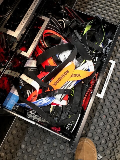 a drawer full of ski race straps
